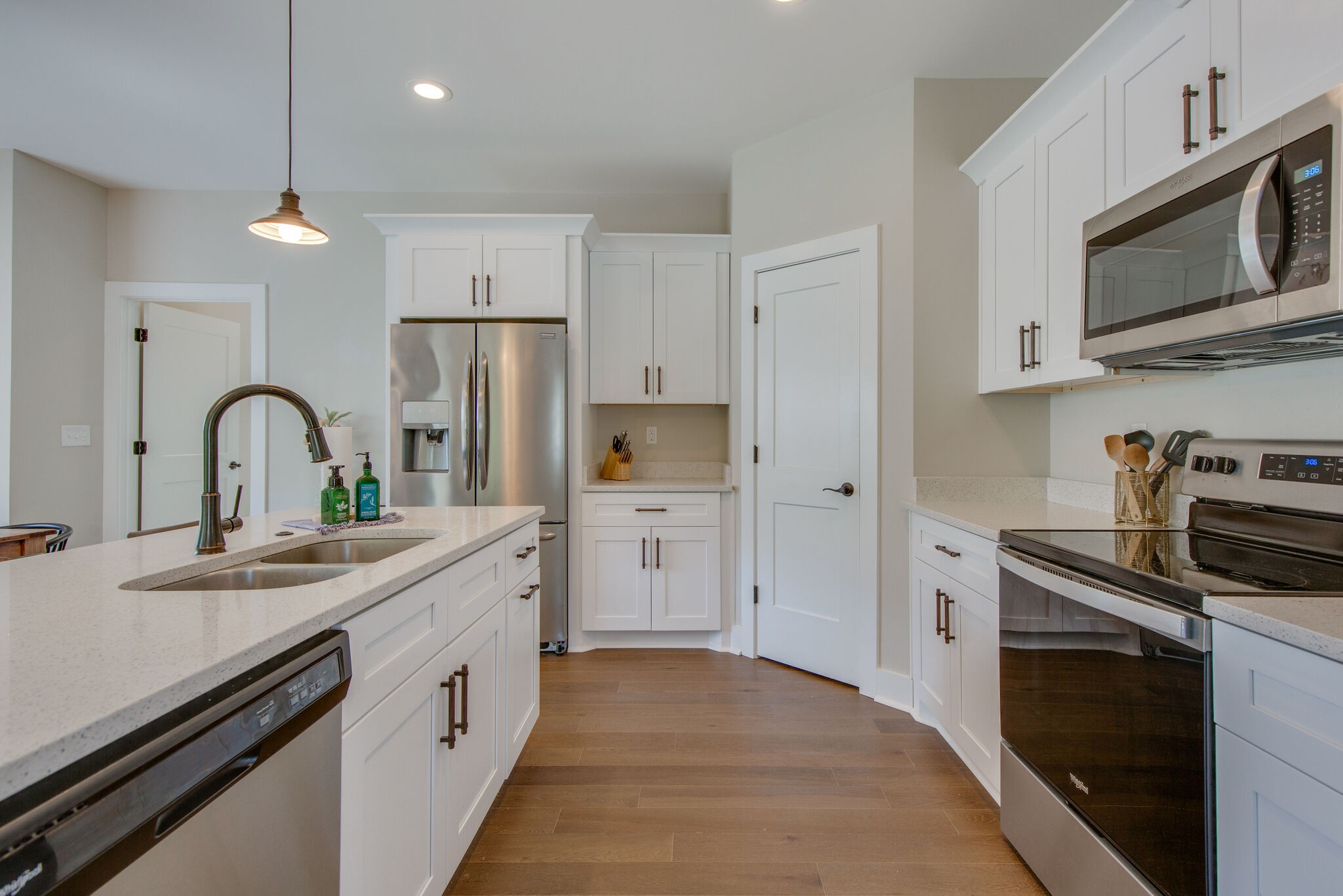 39 Sycamore Ridge West Burns, TN 37029 - Photo 8 of 22 a kitchen with stainless steel appliances a sink stove and refrigerator