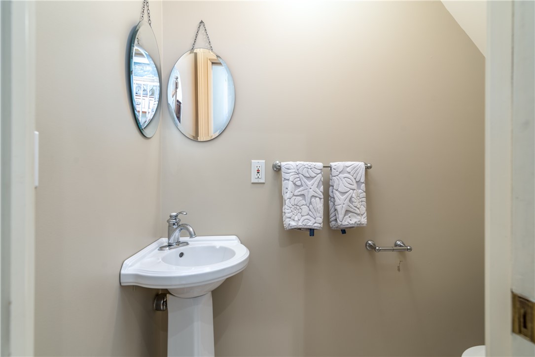 78 Hunters Harbor Road Charlestown, RI 02813 - Photo 26 of 47 Half bath off landing on stairwell