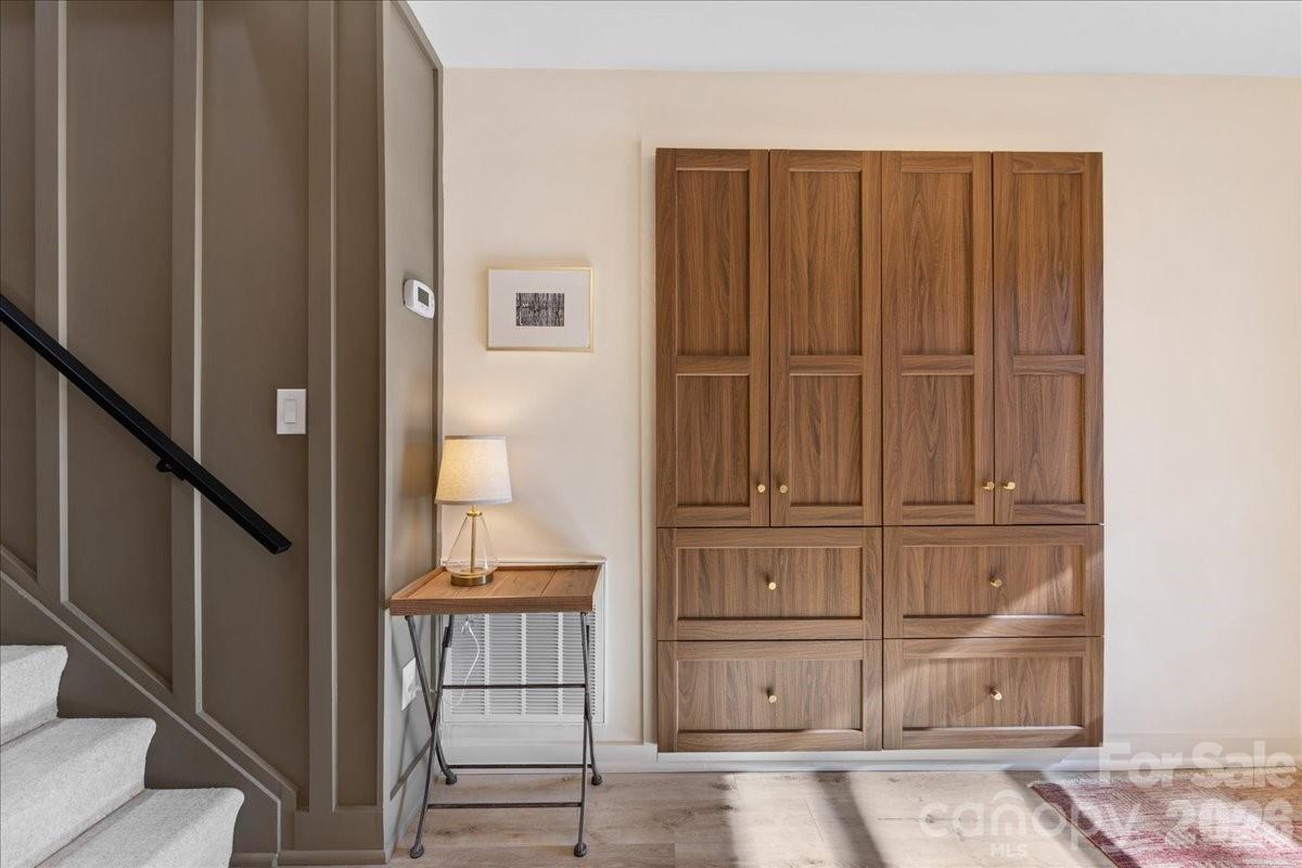 5801 Sharon Road, Unit J Charlotte, NC 28210 - Photo 2 of 46 a view of front door with wooden floor