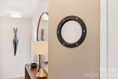 a close view of light fixtures and a mirror of a bathroom