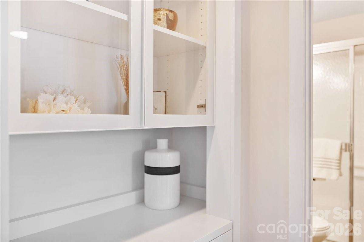5801 Sharon Road, Unit J Charlotte, NC 28210 - Photo 34 of 46 a picture of a bathroom with a sink and a window