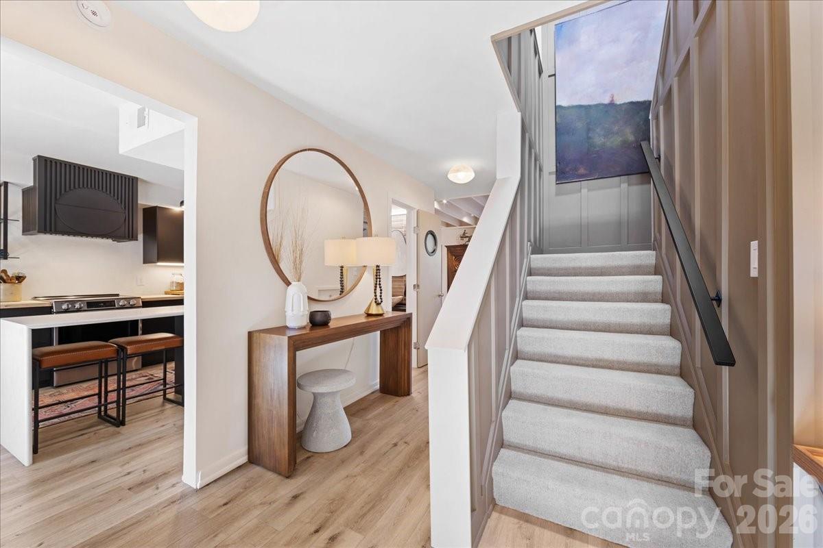 5801 Sharon Road, Unit J Charlotte, NC 28210 - Photo 4 of 46 a view of living room with furniture and a flat screen tv