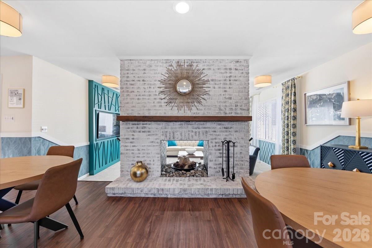 5801 Sharon Road, Unit J Charlotte, NC 28210 - Photo 44 of 46 a living room with furniture and a fireplace