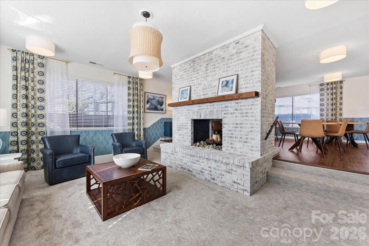 5801 Sharon Road, Unit J Charlotte, NC 28210 - Photo 46 of 46 a living room with furniture and a fireplace