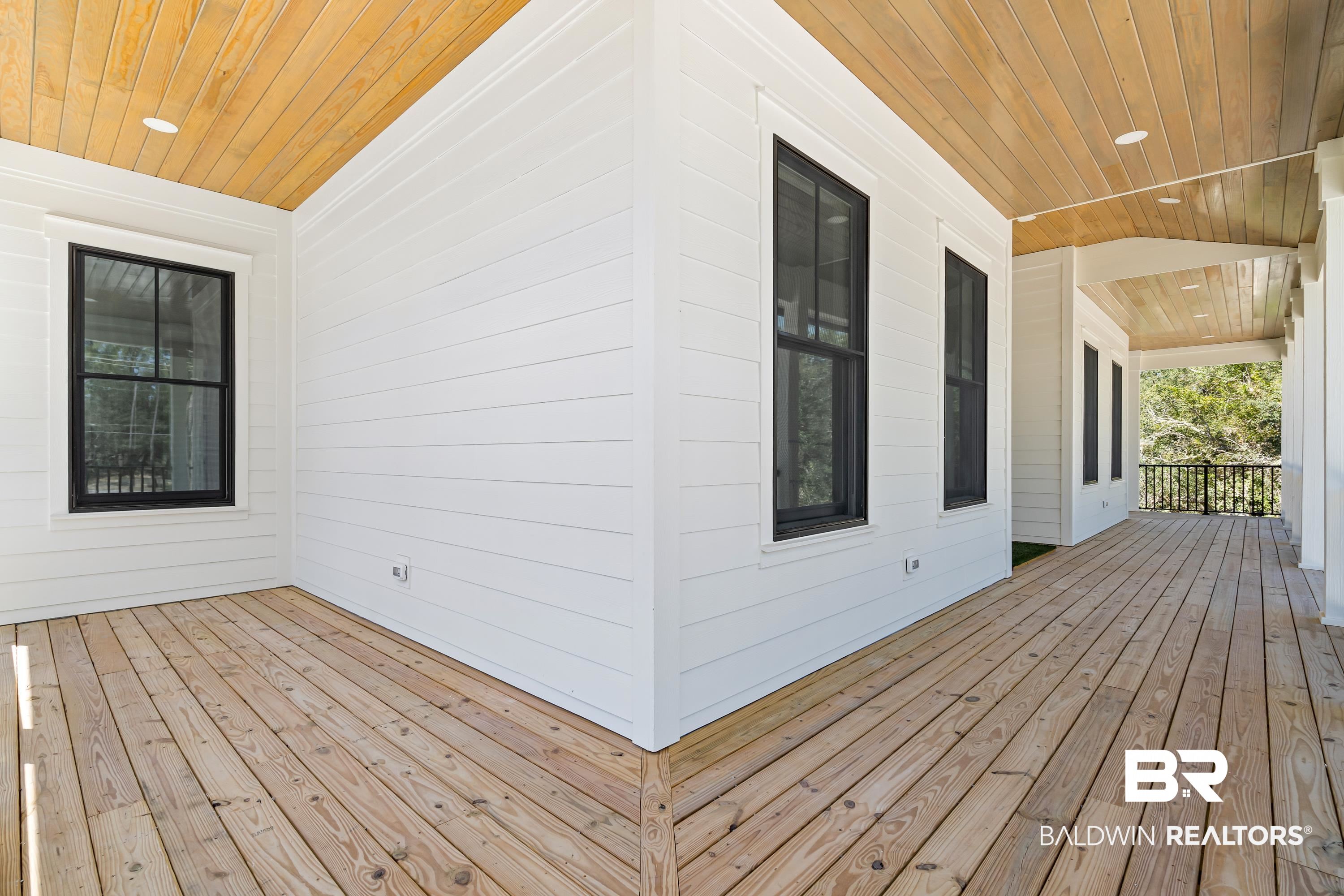 14686 State Highway Gulf Shores, AL 36542 - Photo 39 of 44 Wooden terrace with a porch