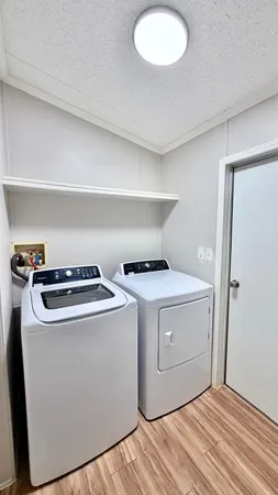 a utility room with washer and dryer
