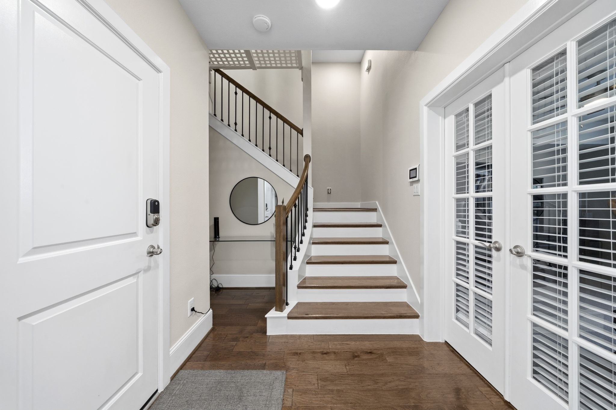 5467 Larkin Street Houston, TX 77007 - Photo 4 of 33 a view of staircase with white walls and a window
