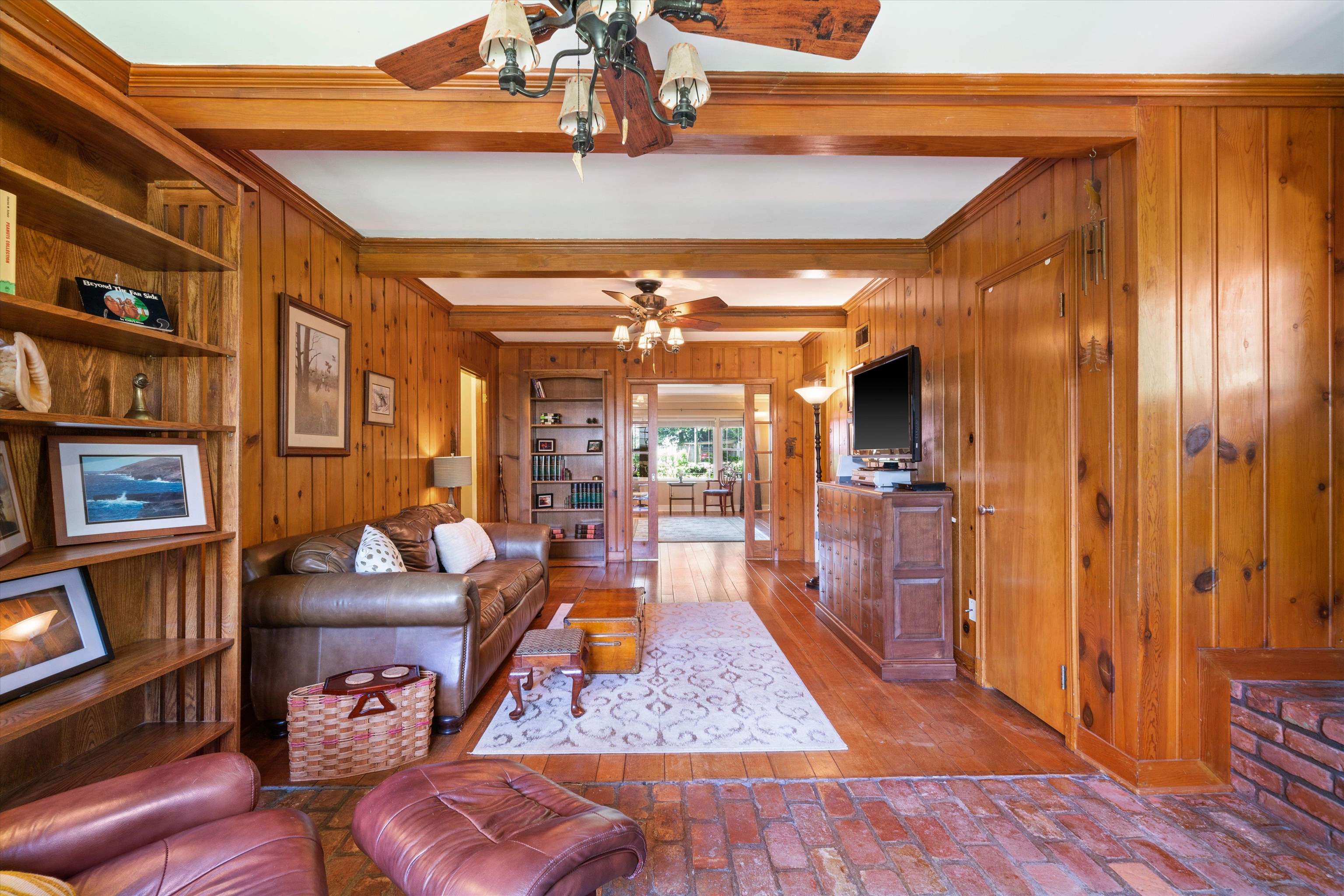 3374 Walnut Grove Road Memphis, TN 38111 - Photo 8 of 25 a living room with furniture rug and wooden floor