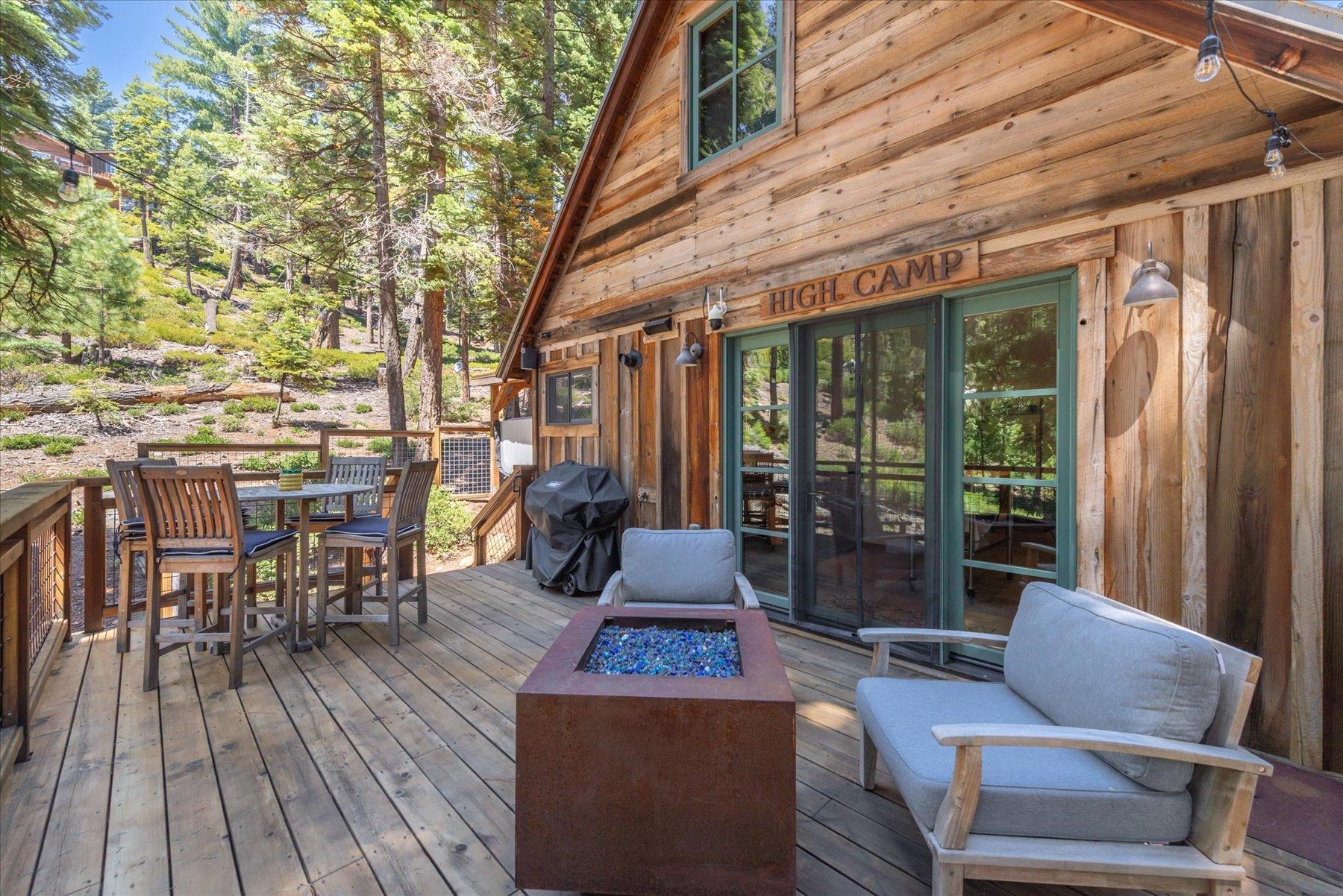 625 High Street Carnelian Bay, CA 96140 - Photo 16 of 22 a building outdoor space with patio furniture and wooden floor