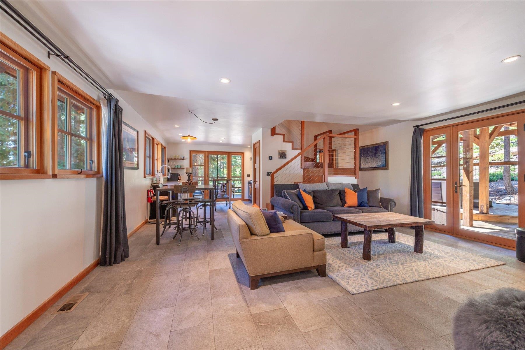 625 High Street Carnelian Bay, CA 96140 - Photo 4 of 22 a living room with furniture and a large window