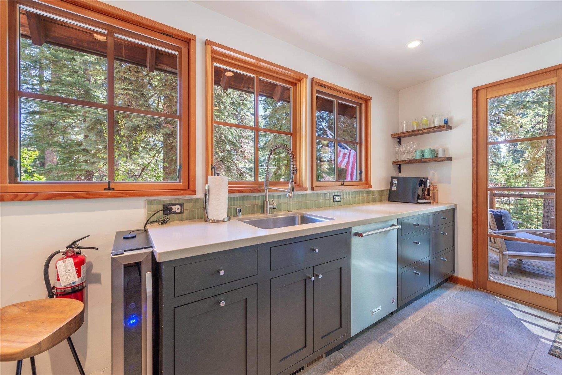 625 High Street Carnelian Bay, CA 96140 - Photo 10 of 22 a kitchen with a sink and a window