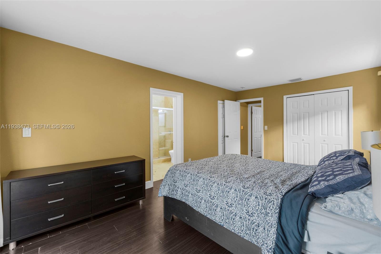 6086 Southwest 20th Street Miami, FL 33155 - Photo 17 of 35 a bedroom with a bed and a dresser