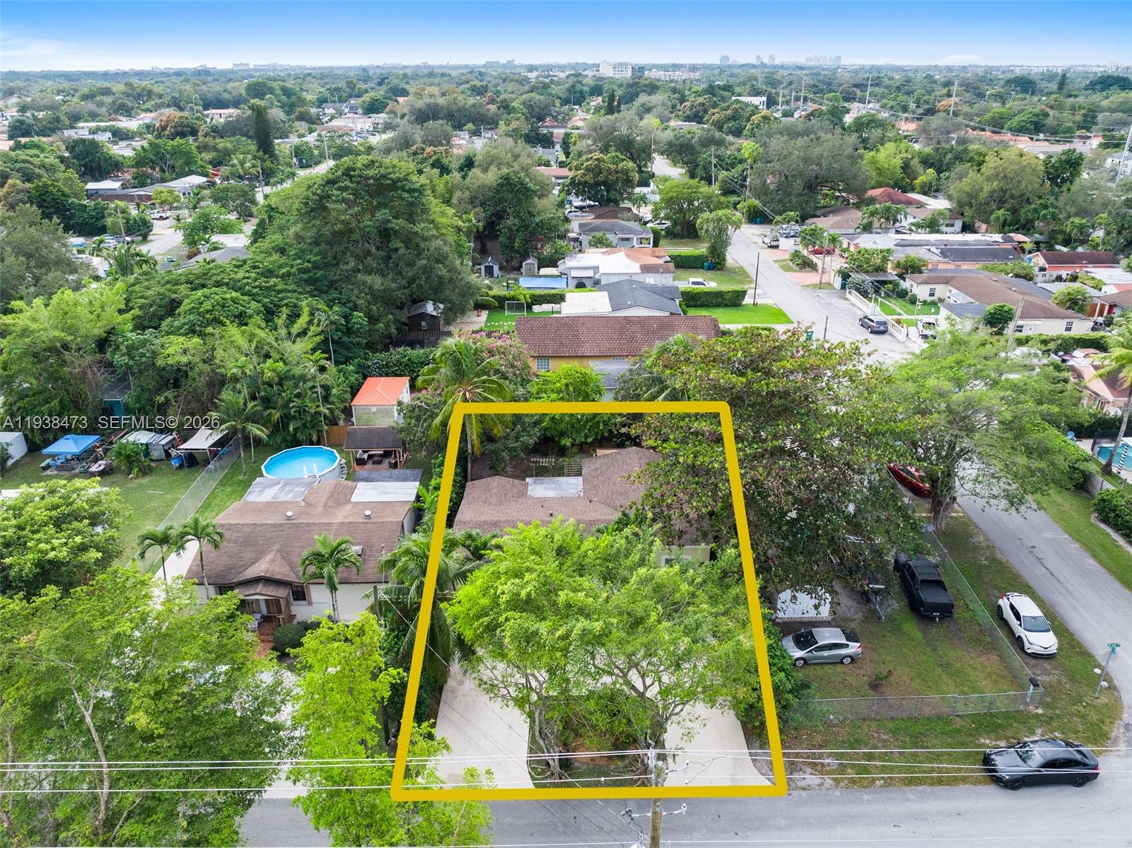 6086 Southwest 20th Street Miami, FL 33155 - Photo 28 of 35 an aerial view of a house with a yard