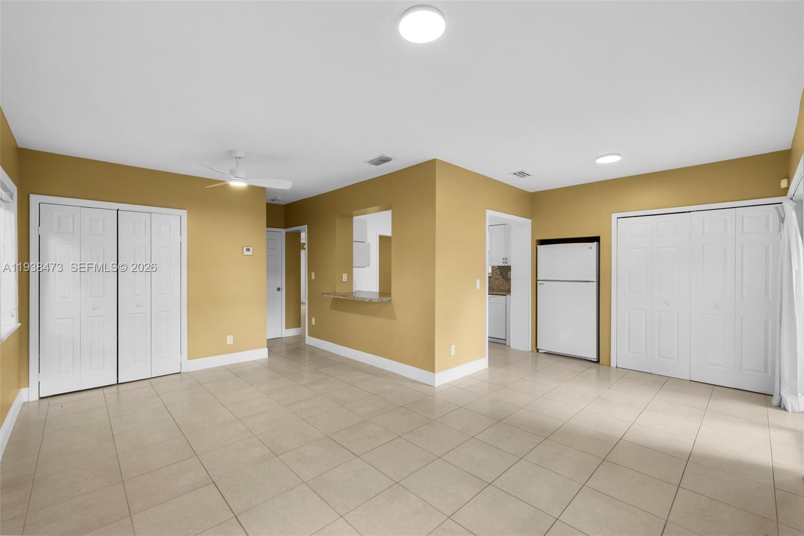 6086 Southwest 20th Street Miami, FL 33155 - Photo 8 of 35 an empty room with a natural light