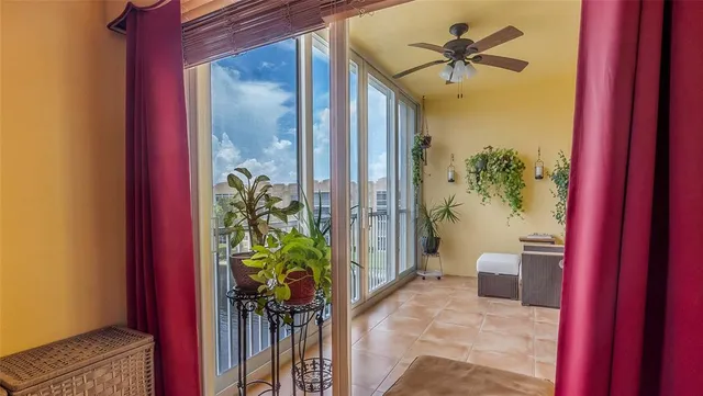 a bed room with a bed and a chandelier