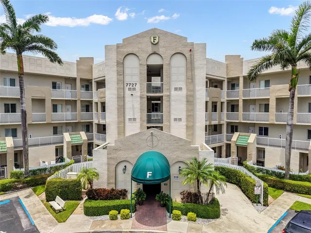 a front view of a multi story residential apartment building