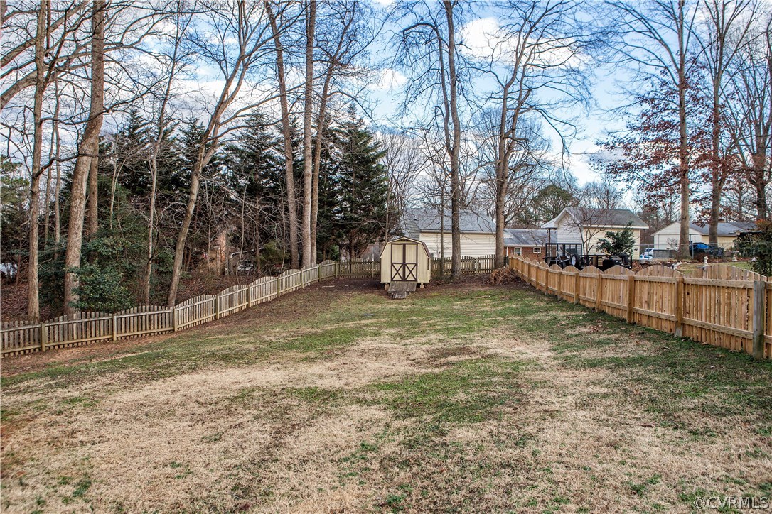 2721 Clintwood Road Midlothian, VA 23112 - Photo 5 of 26 Spacious Fenced Back Yard with Storage Shed.