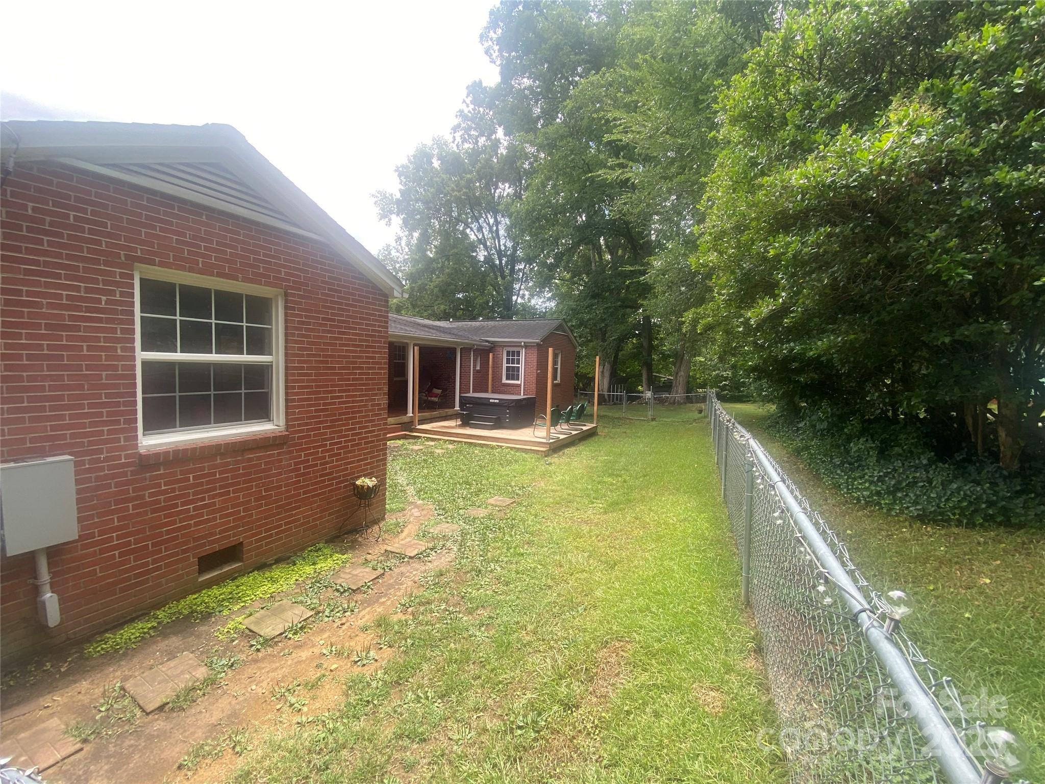704 Marion Sims Drive Lancaster, SC 29720 - Photo 7 of 7 a house with swimming pool