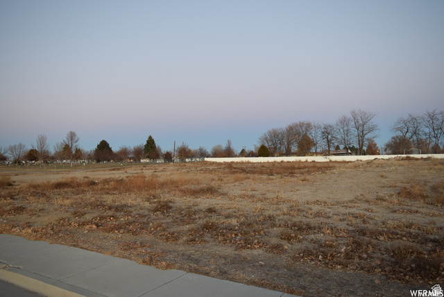 595 Esquire Parkway, Unit 7 Castle Dale, UT 84513 - Photo 1 of 5 Expansive undeveloped land parcel featuring a clear, level surface