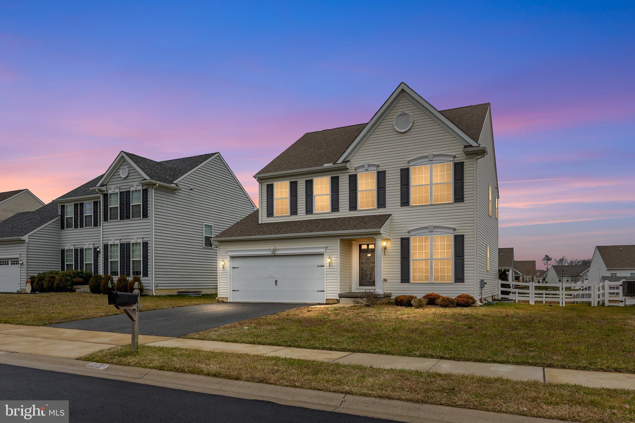 413 Janets Way Townsend, DE 19734 - Photo 1 of 27 a front view of a house with garden