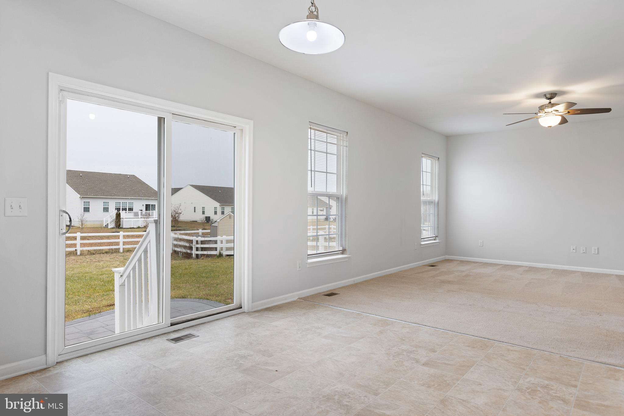 413 Janets Way Townsend, DE 19734 - Photo 11 of 27 an empty room with windows and closet
