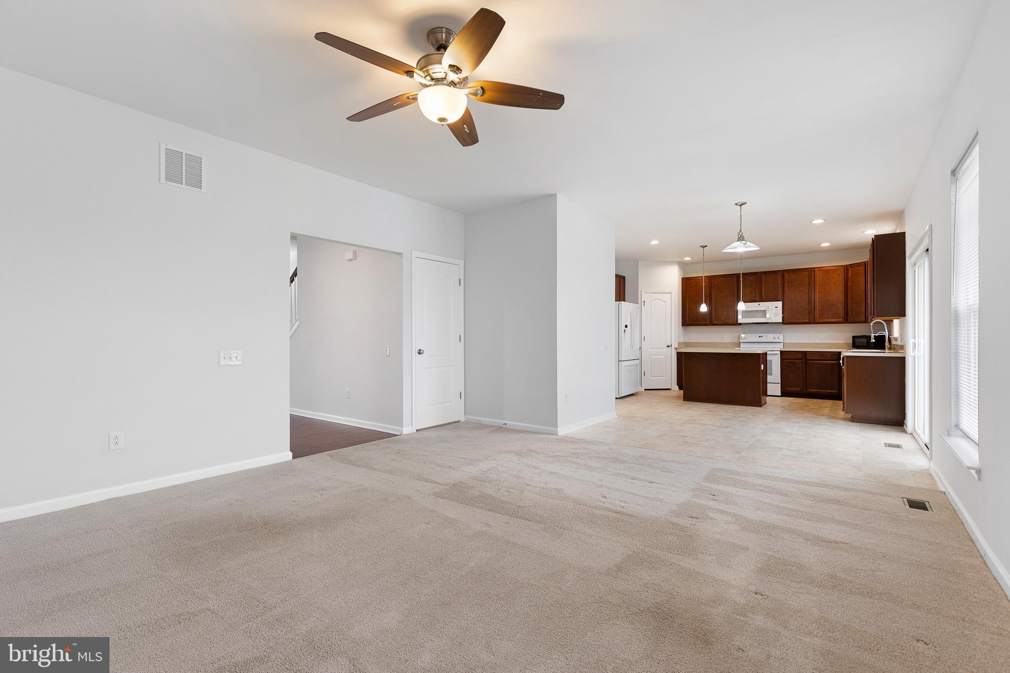 413 Janets Way Townsend, DE 19734 - Photo 13 of 27 a view of a kitchen with a sink and a kitchen