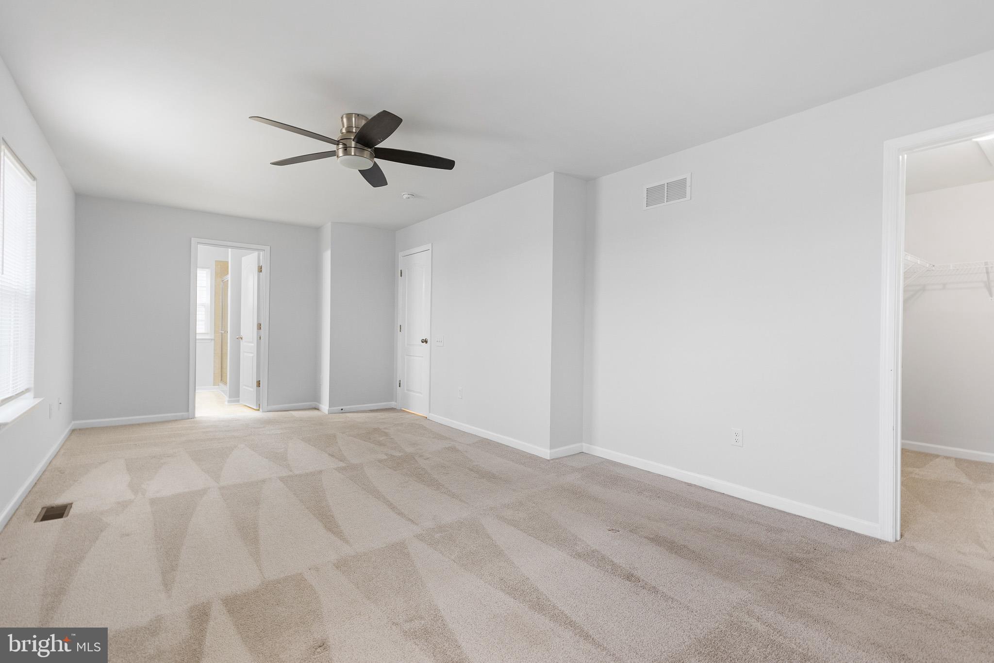 413 Janets Way Townsend, DE 19734 - Photo 19 of 27 a view of empty room with ceiling fan