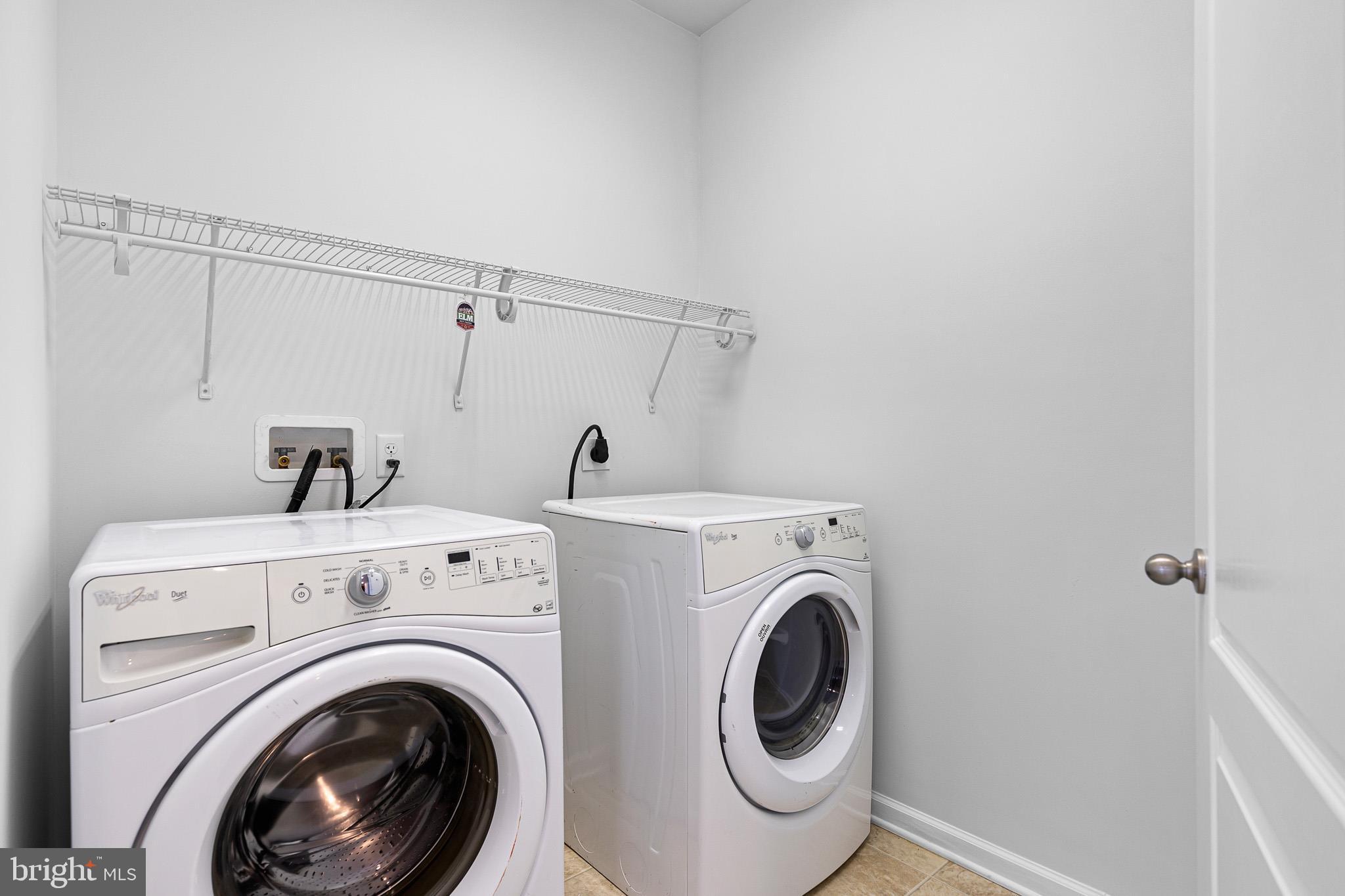 413 Janets Way Townsend, DE 19734 - Photo 10 of 27 a utility room with dryer and washer