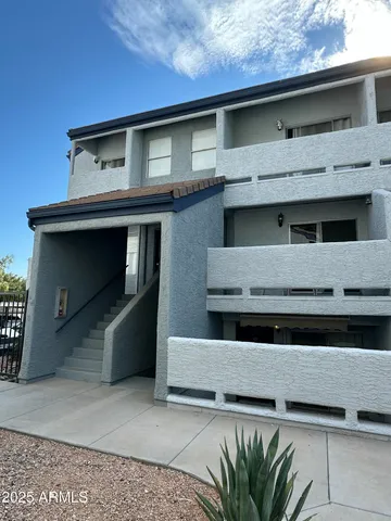 a front view of a house with a garage