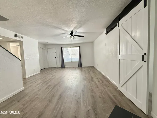 a view of entryway with wooden floor