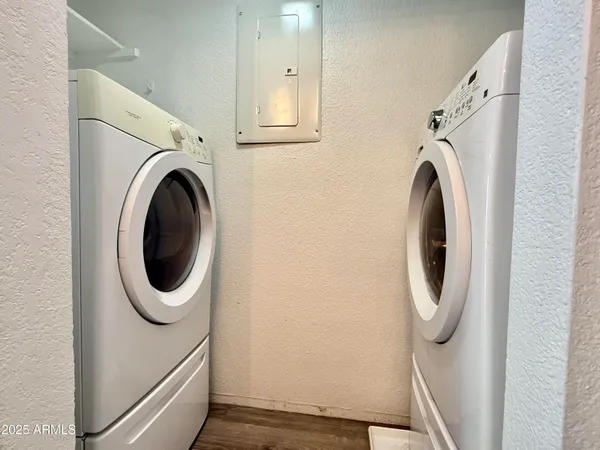 a utility room with dryer and washer