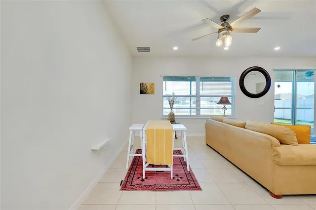 a bathroom with a sink vanity and mirror