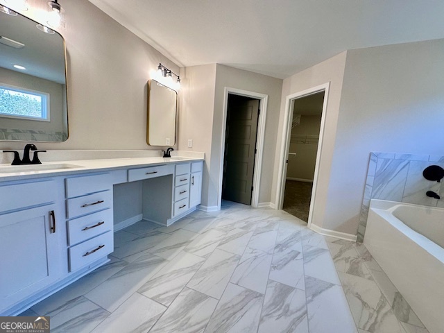 30 Shadybrook Path Newnan, GA 30263 - Photo 18 of 26 a spacious bathroom with a tub sink and mirror