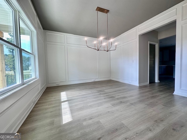 30 Shadybrook Path Newnan, GA 30263 - Photo 2 of 26 wooden floor in an empty room with a window