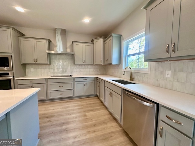 30 Shadybrook Path Newnan, GA 30263 - Photo 4 of 26 a kitchen with stainless steel appliances sink cabinets and window