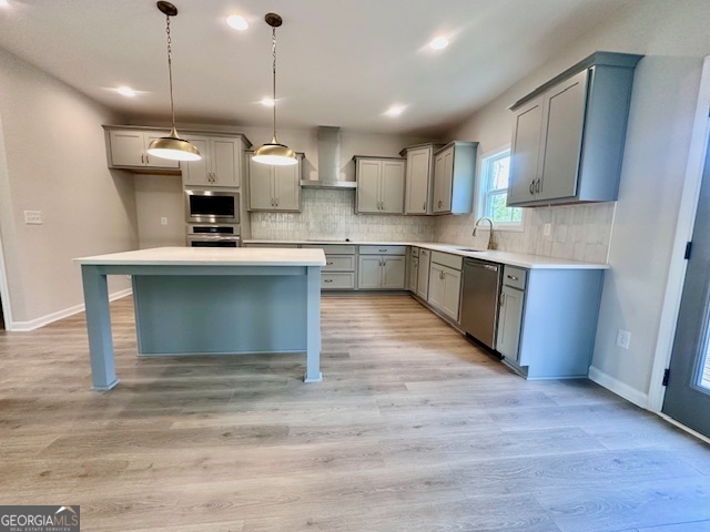 30 Shadybrook Path Newnan, GA 30263 - Photo 5 of 26 a open kitchen with kitchen island a sink stainless steel appliances and cabinets