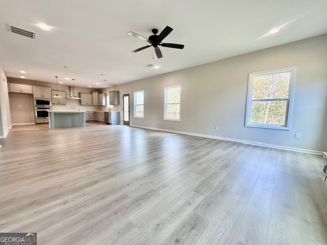 30 Shadybrook Path Newnan, GA 30263 - Photo 9 of 26 a view of an empty room with wooden floor and a window