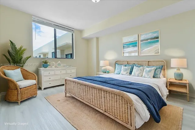 a spacious bedroom with a bed and a couch