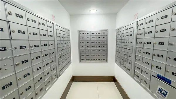 a view of a living room and a large window