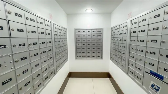 a view of a living room and a large window