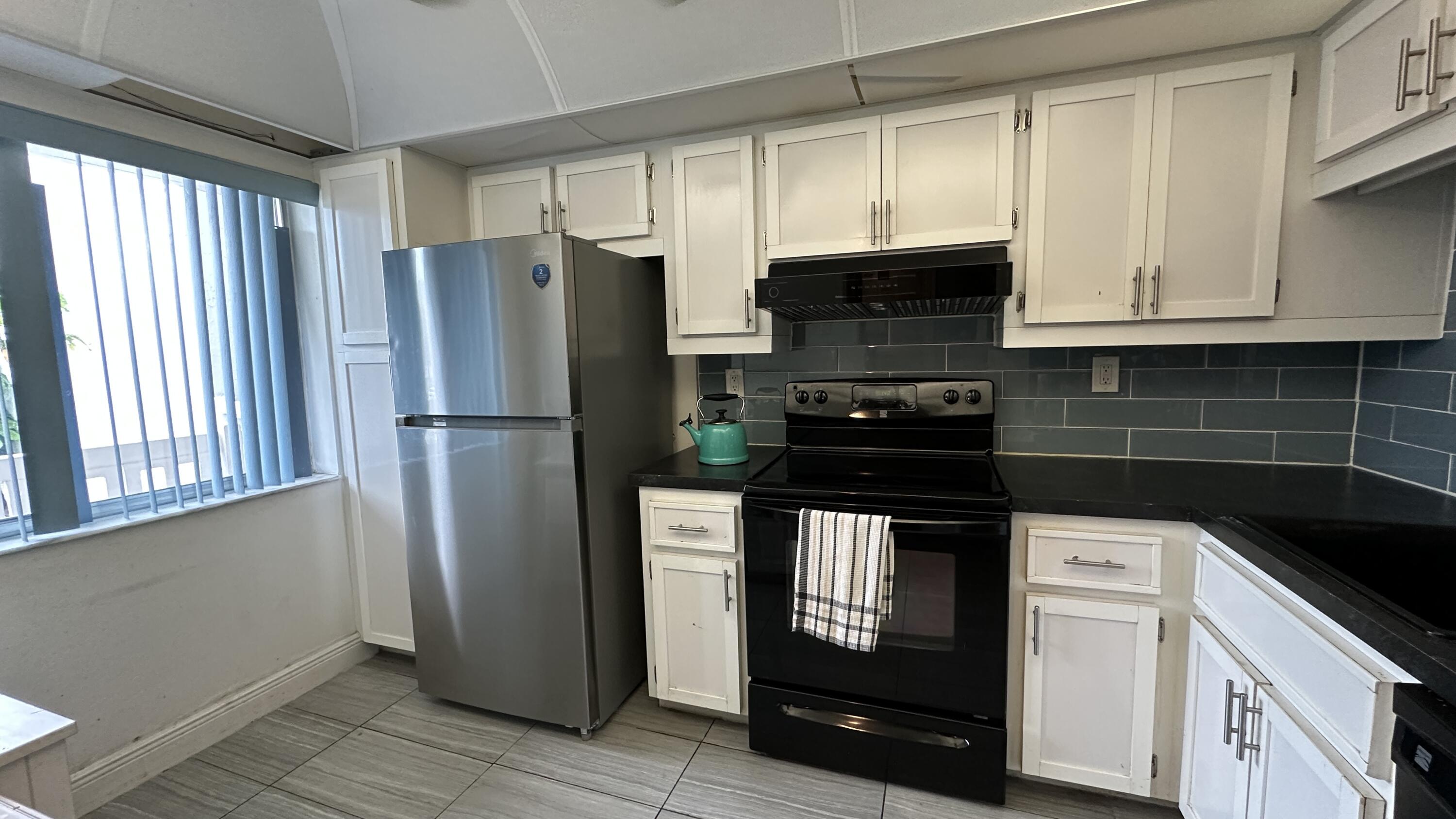 3601 Inverrary Drive, Unit 206 Lauderhill, FL 33319 - Photo 6 of 25 IMG_9751