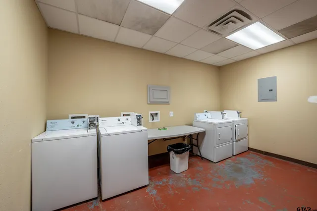a utility room with dryer and washer