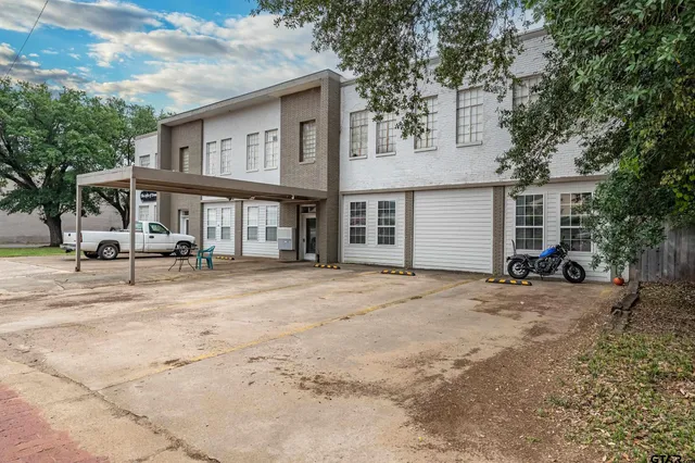 front view of a house with a patio