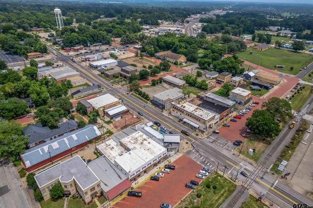 an aerial view of a city with lots of residential buildings