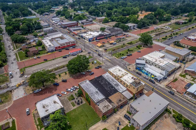 an aerial view of a city with lots of residential buildings