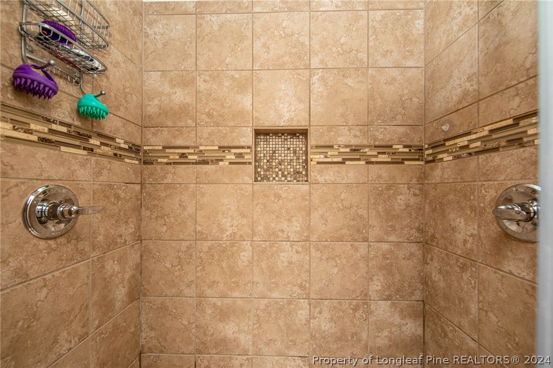 3304 Geyser Peak Road Fayetteville, NC 28306 - Photo 25 of 39 a bathroom with a shower