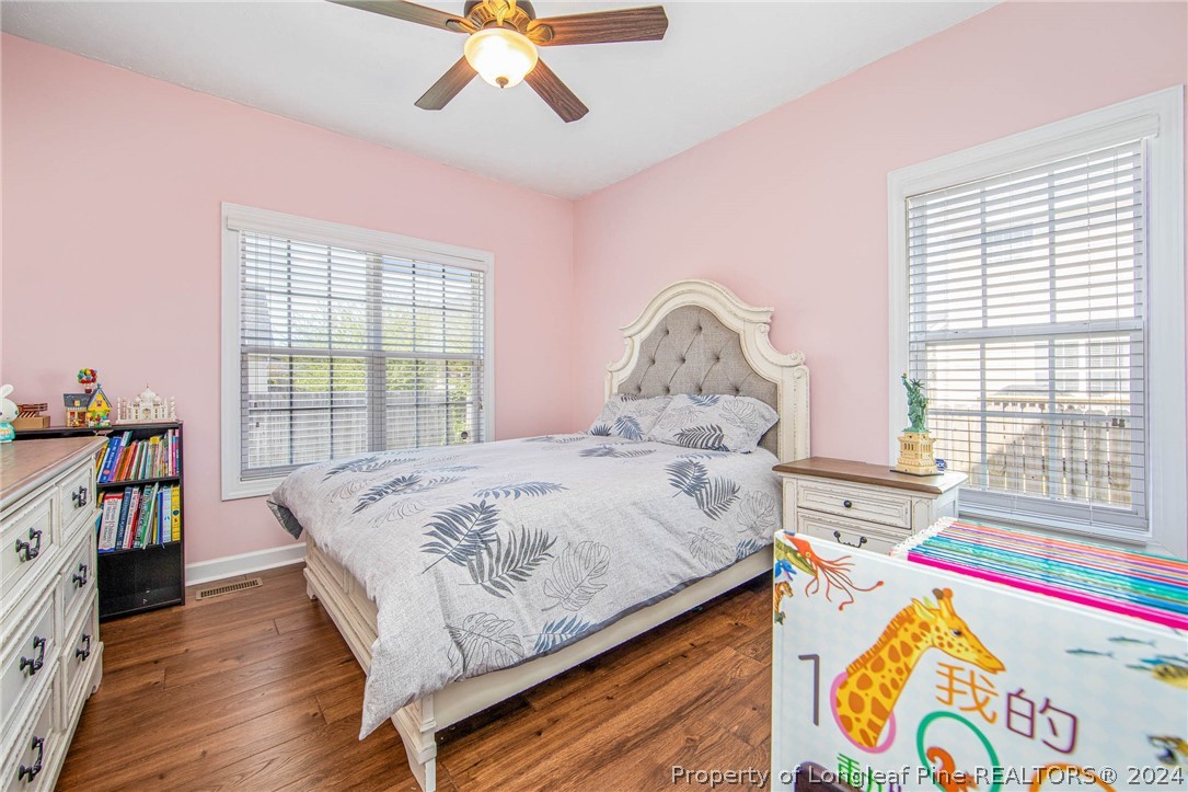 3304 Geyser Peak Road Fayetteville, NC 28306 - Photo 32 of 39 a bed room with a bed and a window