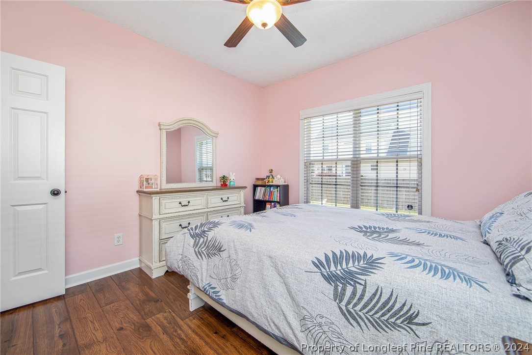3304 Geyser Peak Road Fayetteville, NC 28306 - Photo 33 of 39 a bedroom with a bed and a window