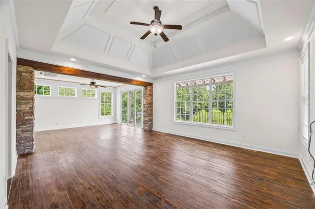 a view of walk in closet with wooden floor and closet