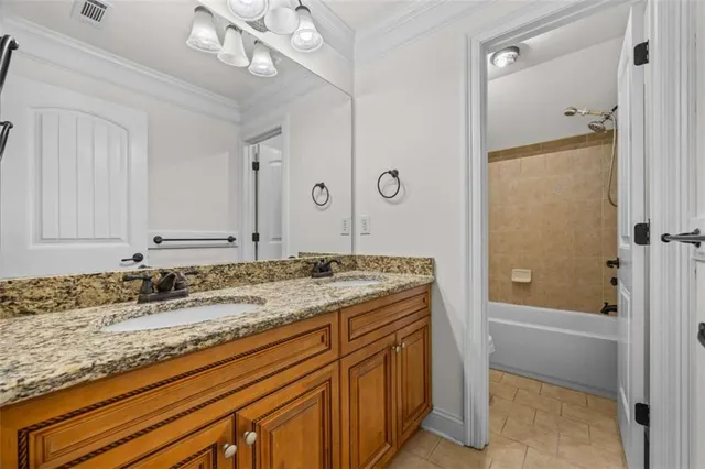 a view of a room with wooden cabinets